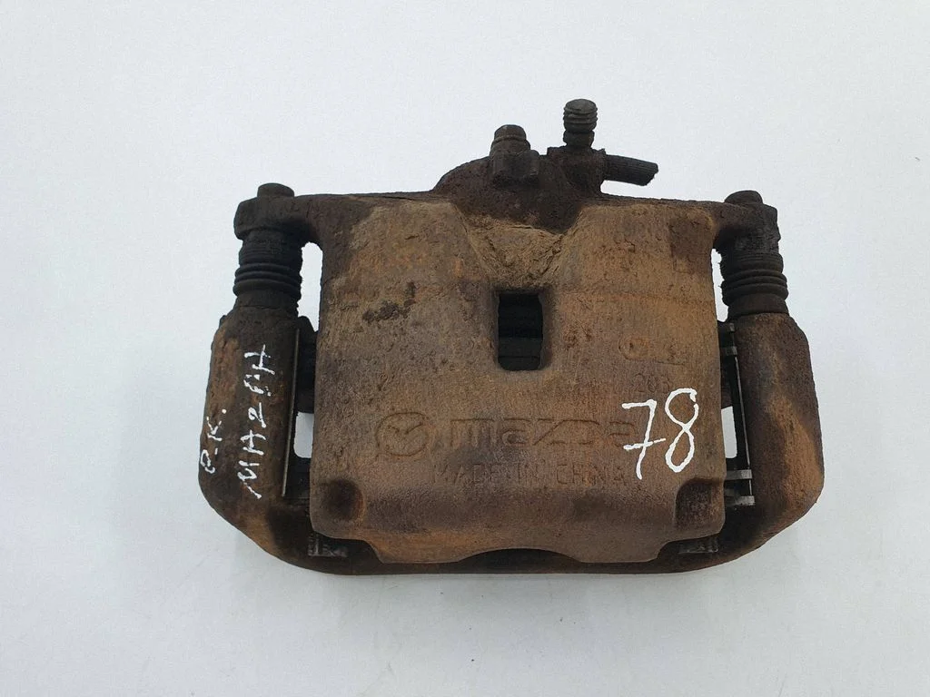 Front brake caliper – front left