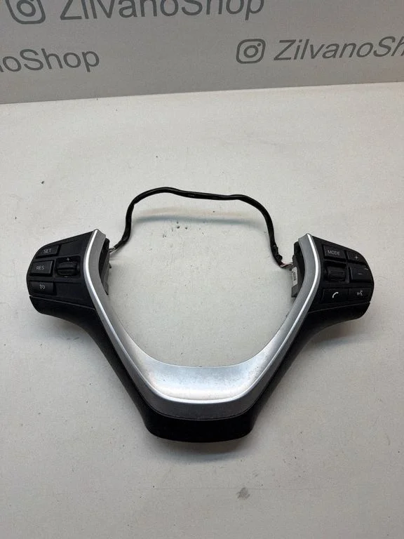 Steering wheel buttons/switches 62563393
