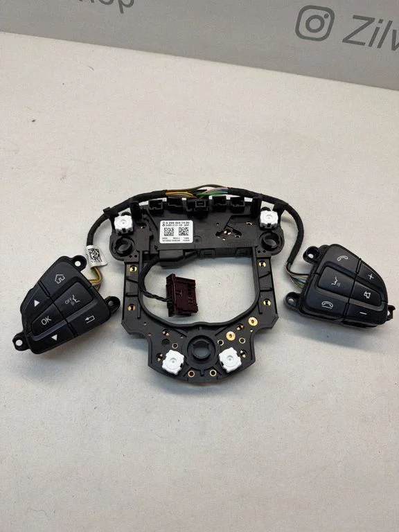 Steering wheel buttons/switches A0994641400