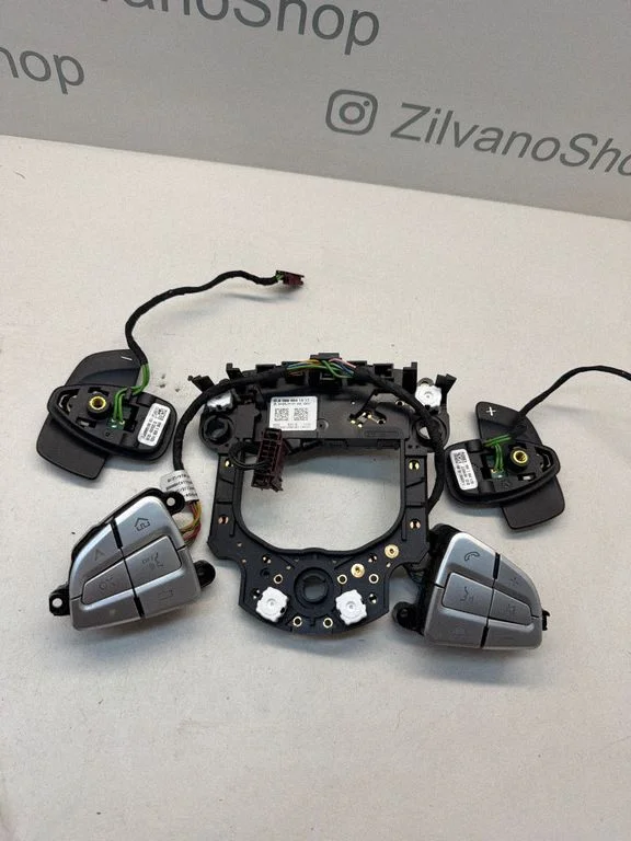 Steering wheel buttons/switches A0994641517