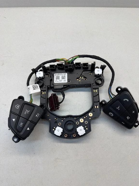 Steering wheel buttons/switches A0994641400