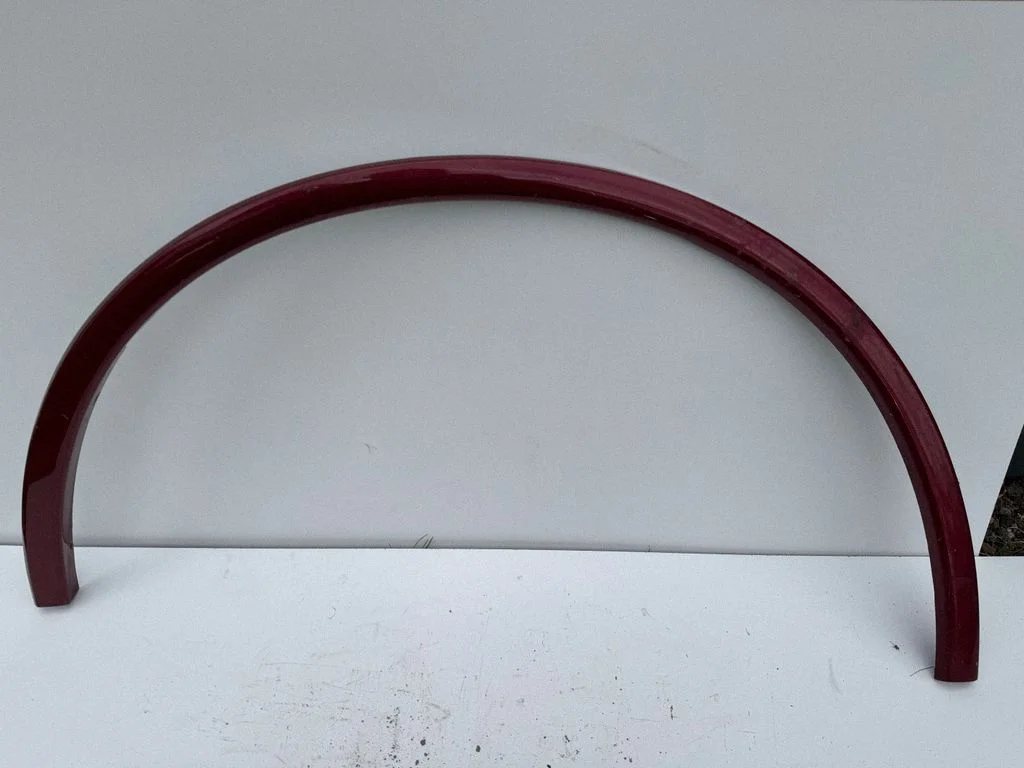 Front arch trim 57010621AA
