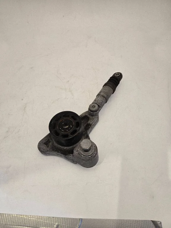 Generator/alternator belt tensioner