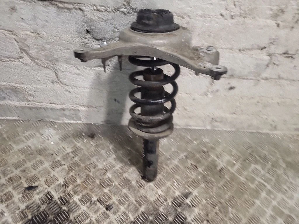 Front shock absorber with coil spring – front right