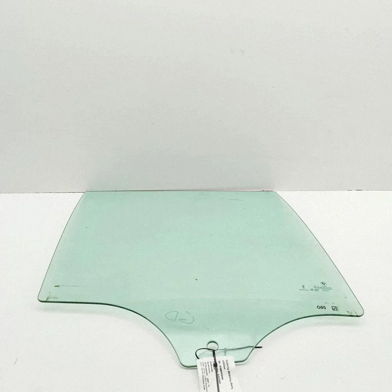 Rear door window glass 7430936