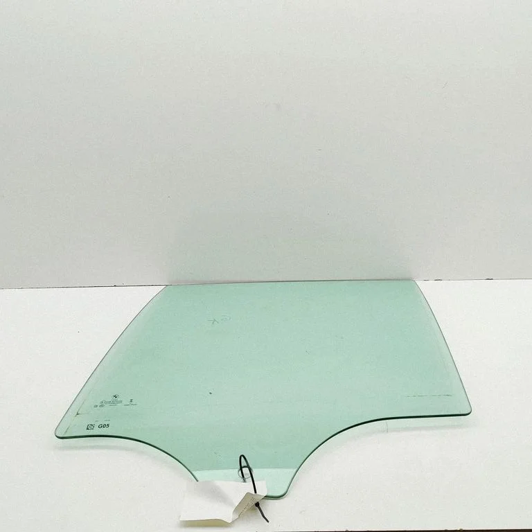 Rear door window glass 7430935
