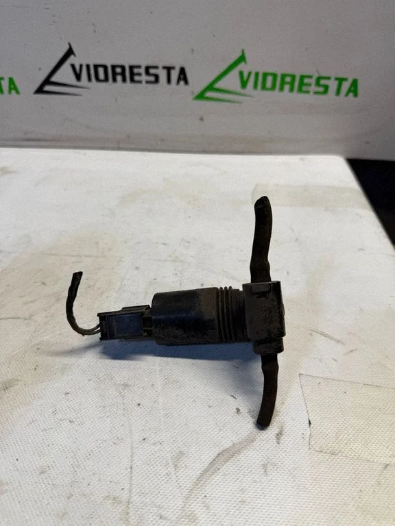 Windshield washer spray nozzle