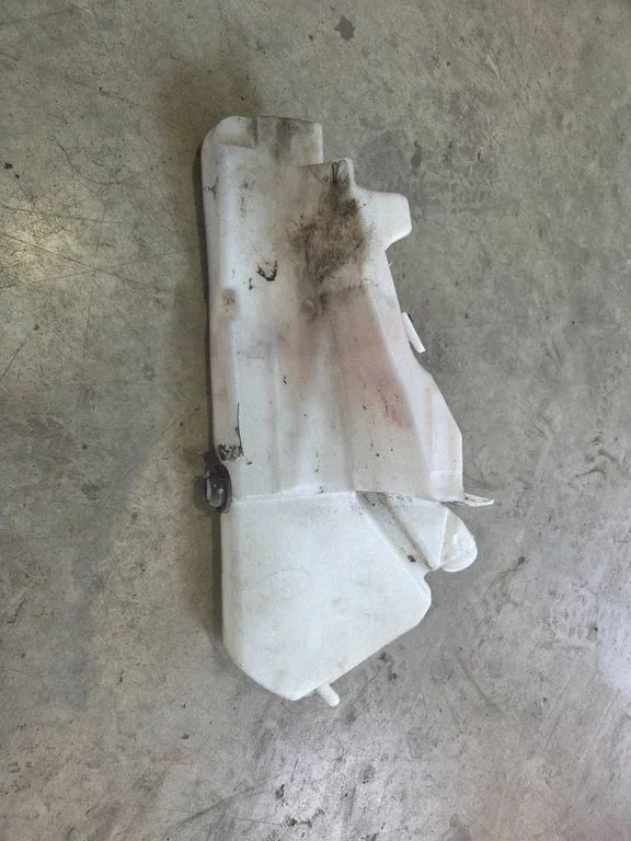 Windshield washer fluid reservoir/tank – Jaguar XE (2015-)