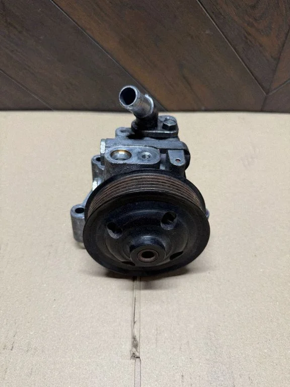 Power steering pump 9X233A696AA