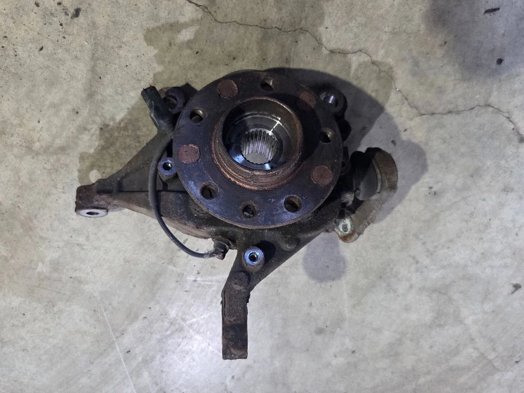 Front wheel hub spindle knuckle – front right