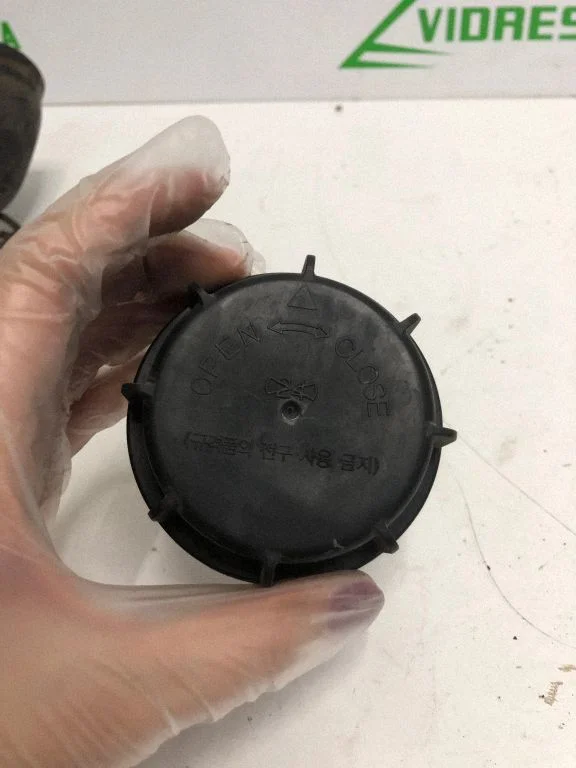 Headlight washer spray nozzle cap/cover