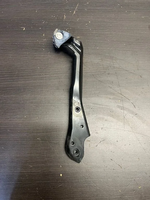 Front door check strap stopper T081L