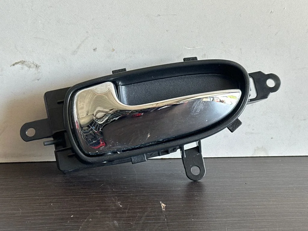 Rear door interior handle trim