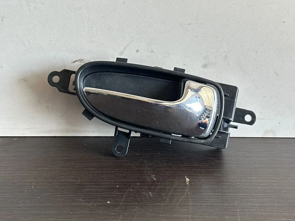 Rear door interior handle trim
