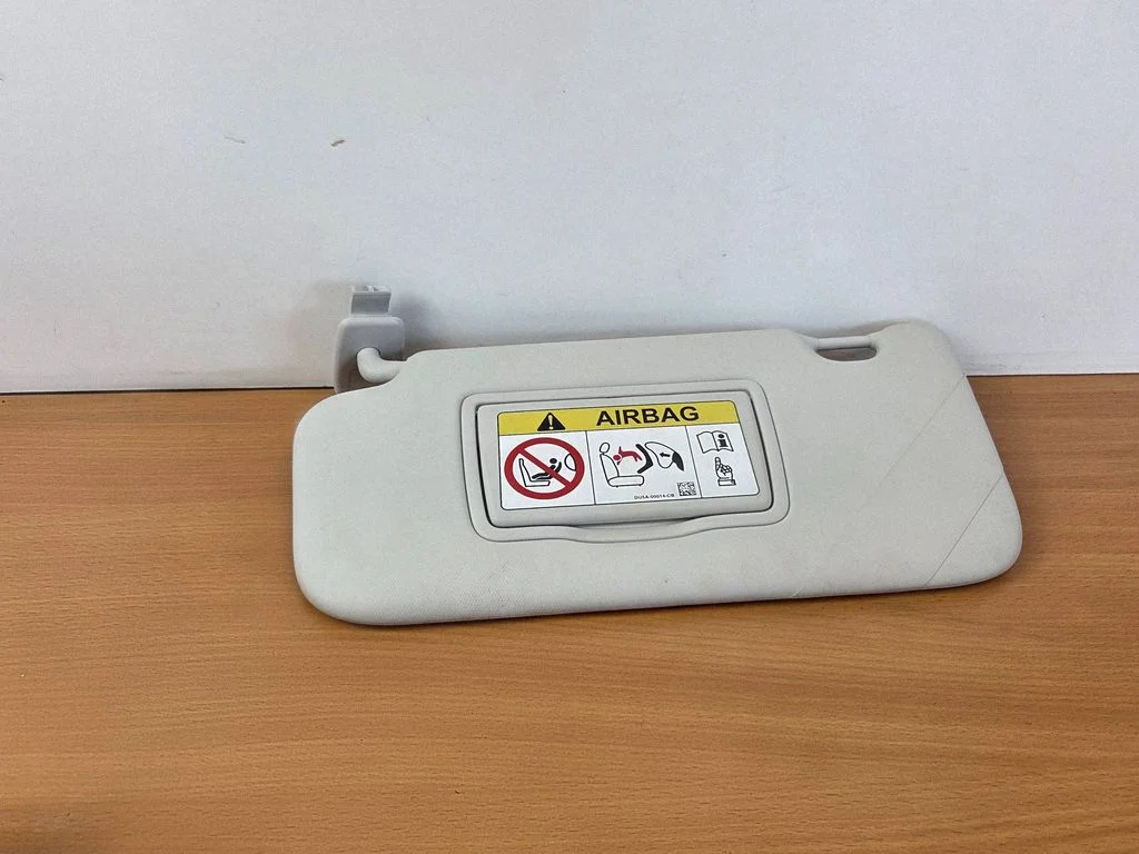 Sun visor – left