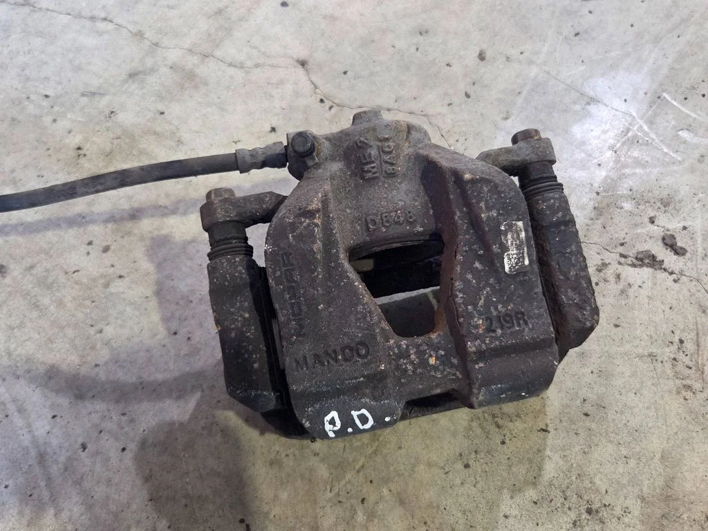Front brake caliper 00534478650