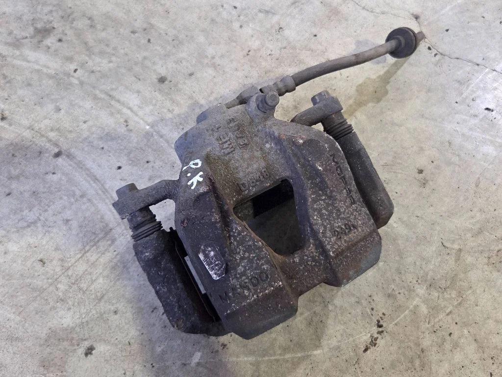 Front brake caliper 00534478660