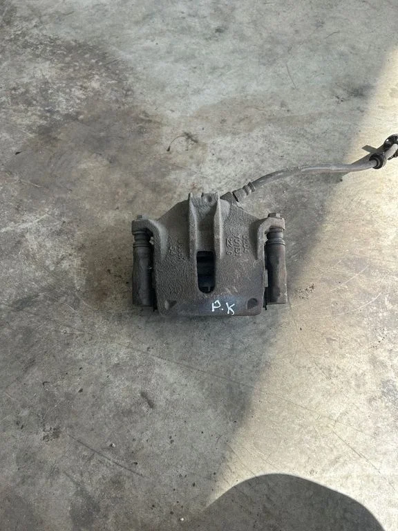 Front brake caliper – front left