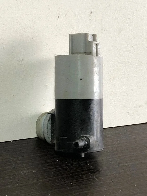 Pompka spryskiwacza szyb 1032551001