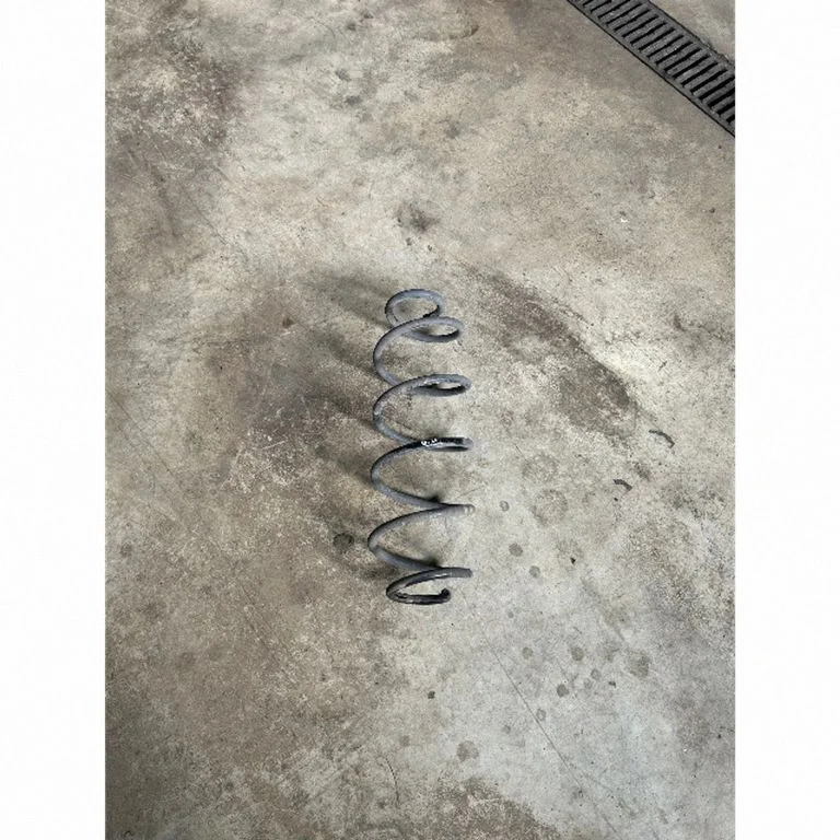 Rear coil spring – right