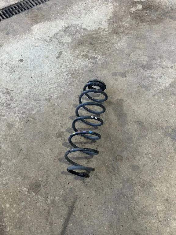 Rear coil spring – rear left