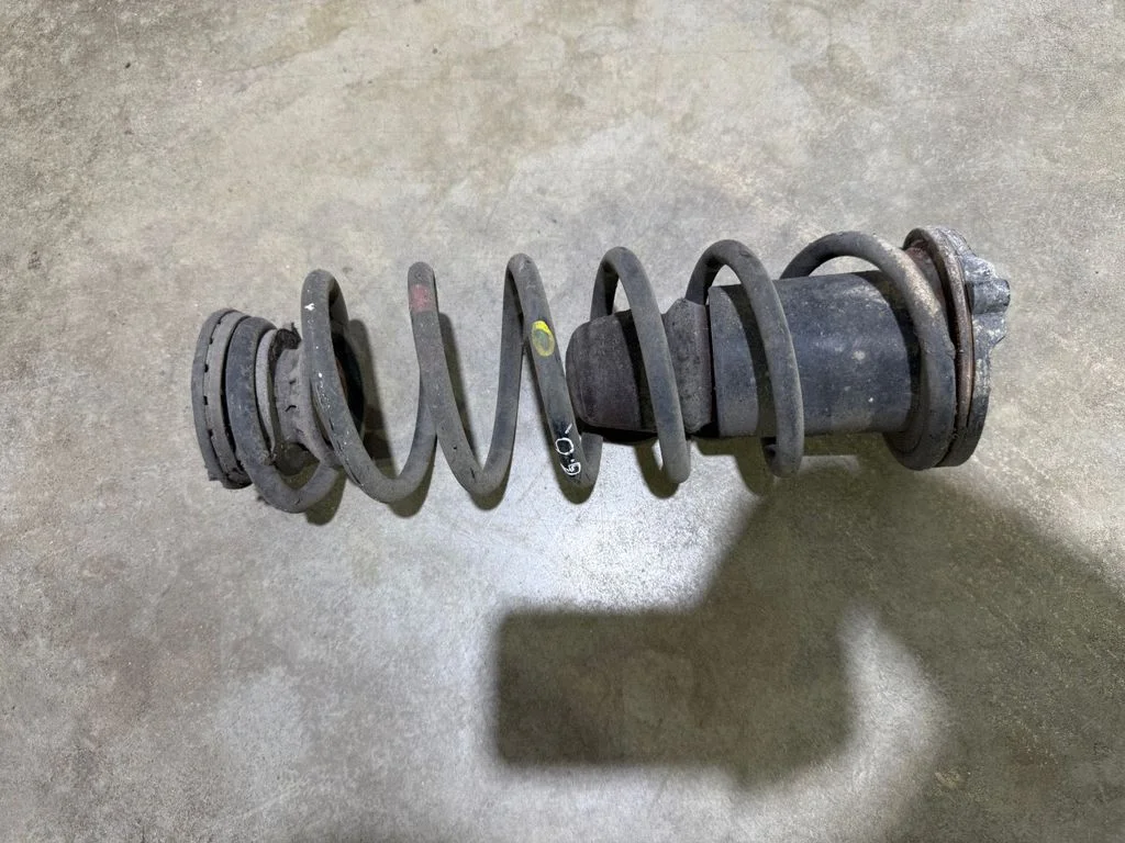 Rear coil spring – rear right