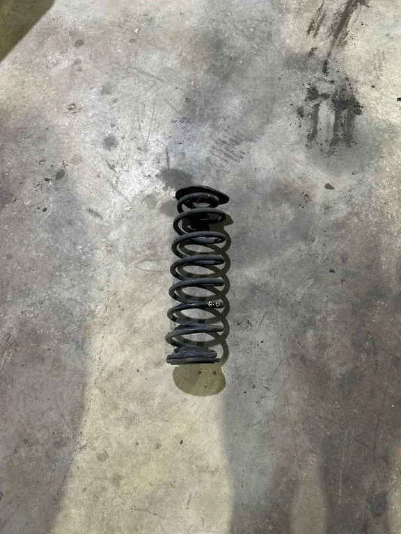 Rear coil spring – right