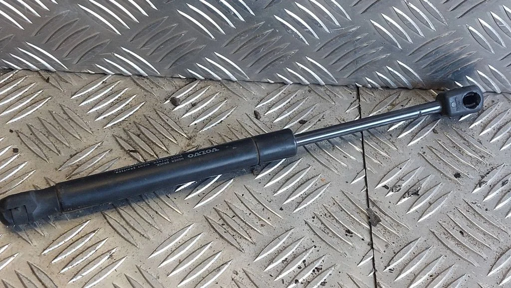 Front bonnet/hood damper/strut 30784935