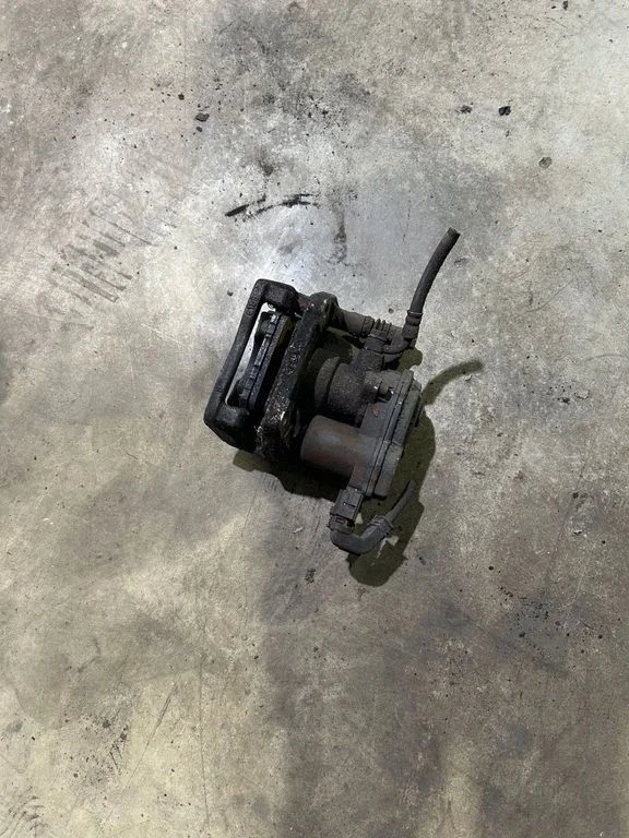 Rear brake caliper – right