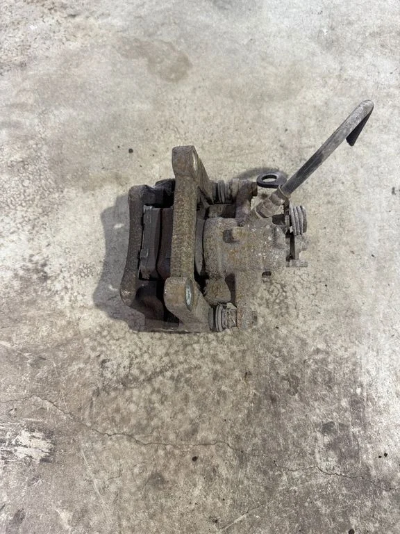 Rear brake caliper – rear left