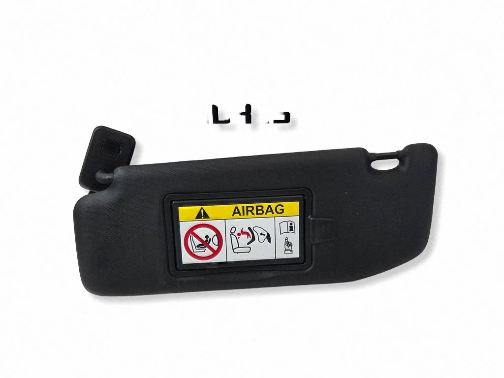 Sun visor – left