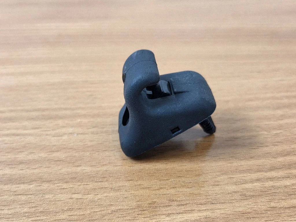 Sun visor clip/hook/bracket