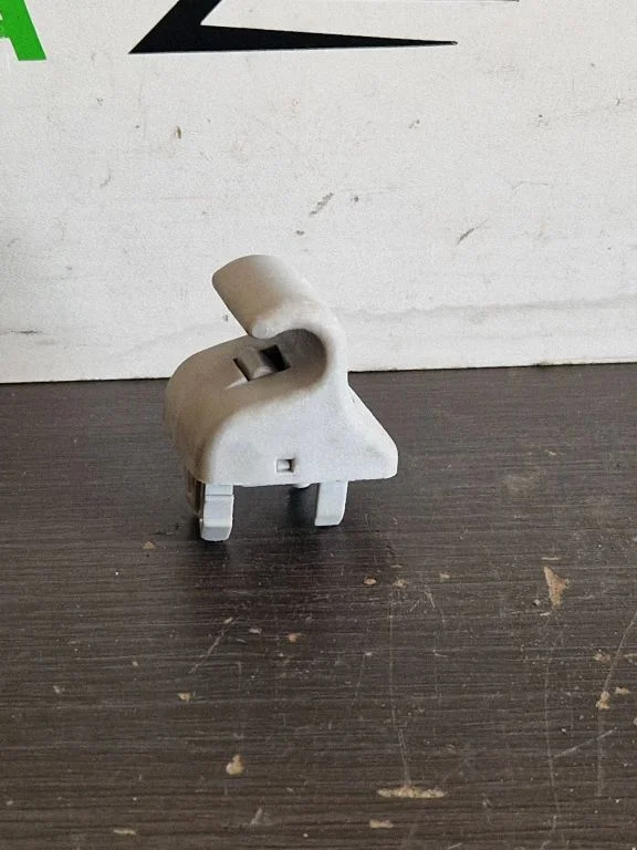 Sun visor clip/hook/bracket