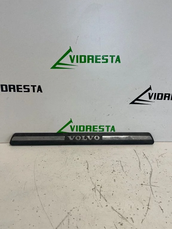 Front sill trim cover 8659960