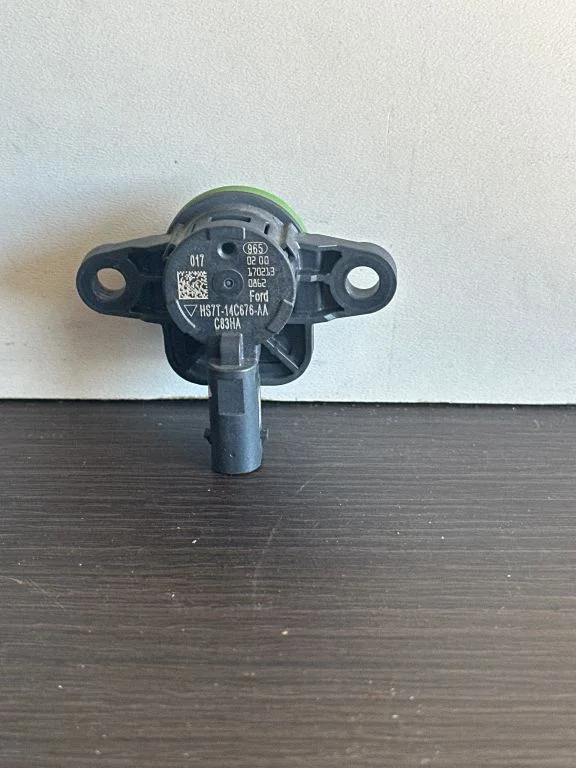 Airbag deployment crash/impact sensor HS7T14C676AA