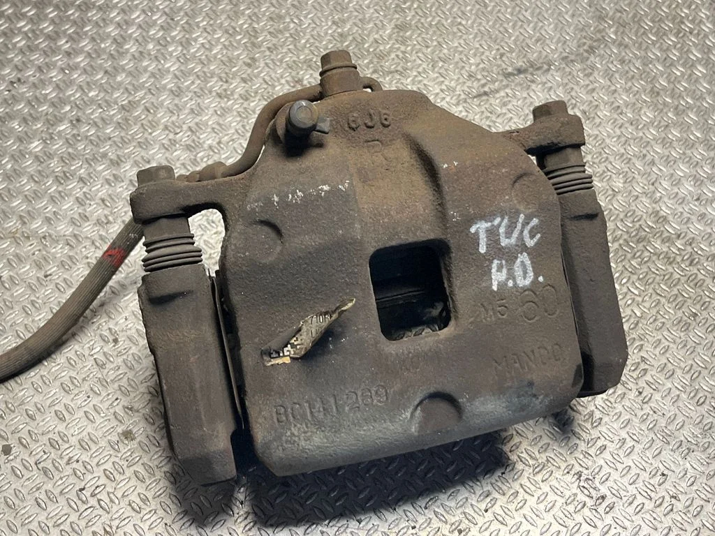 Front brake caliper BC141289