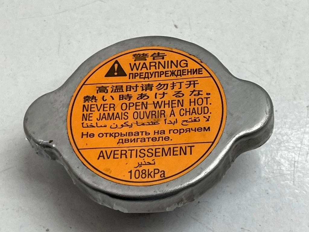 Coolant expansion tank/reservoir cap