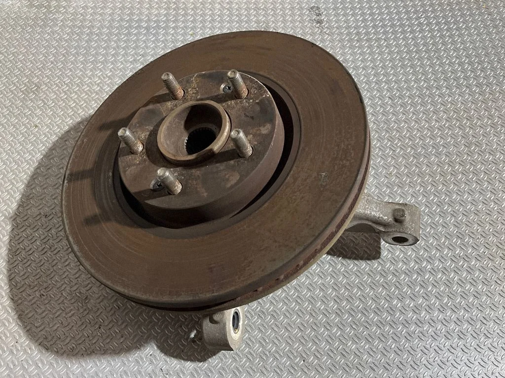 Front wheel hub spindle knuckle – front left