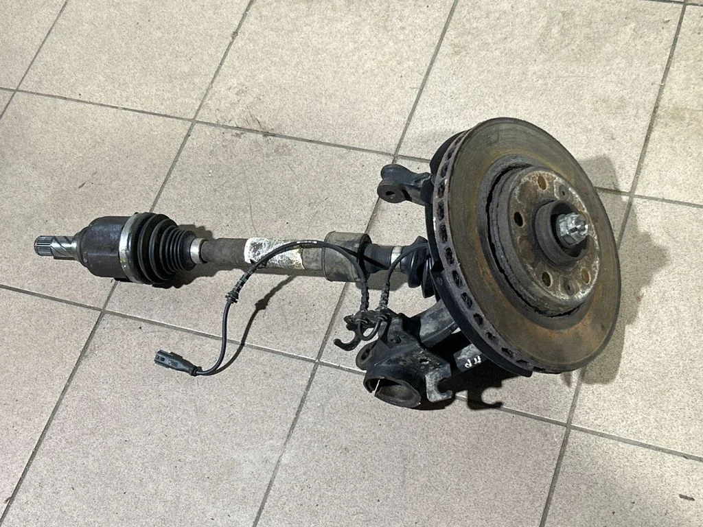 Front wheel hub spindle knuckle – front left