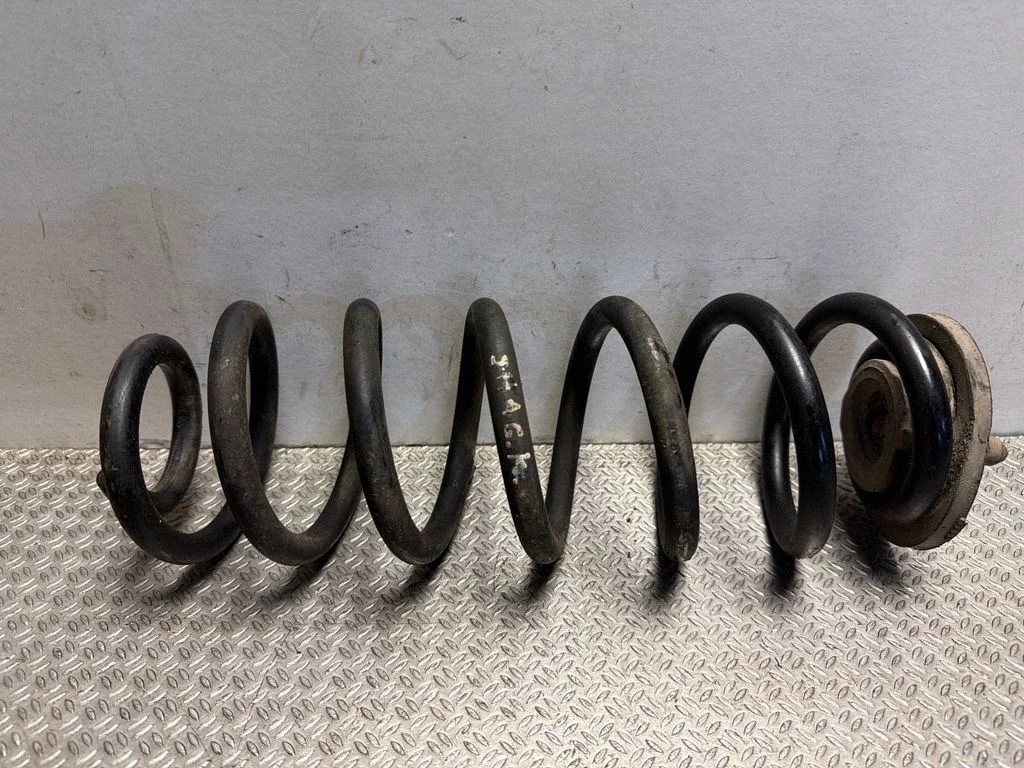 Rear coil spring – rear left