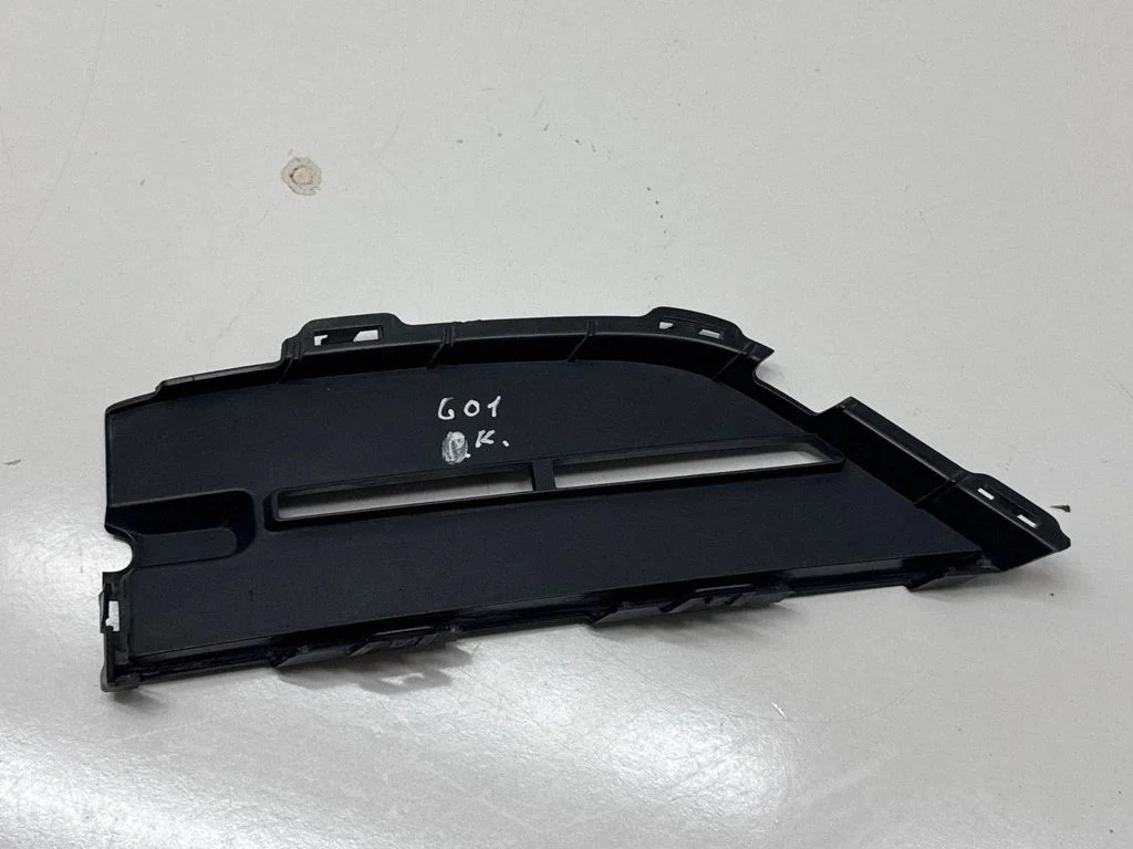 Front fog light trim/grill 7459519
