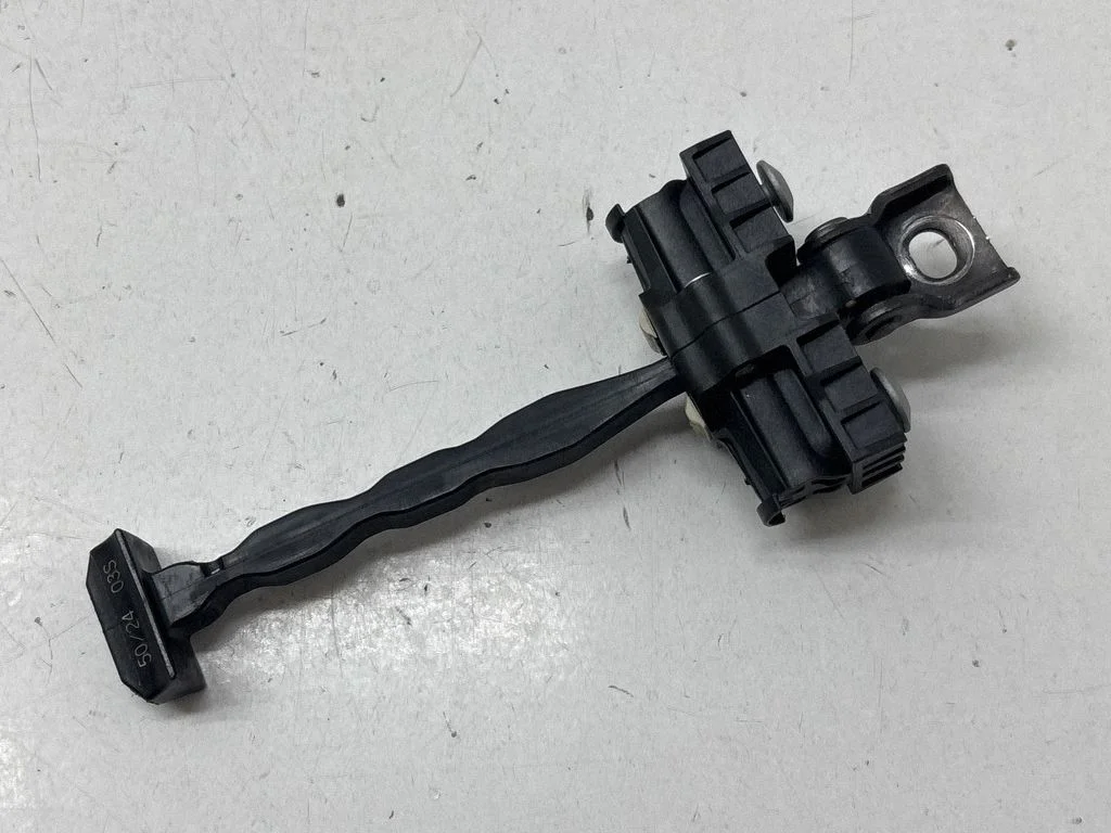 Front door check strap stopper 502403S