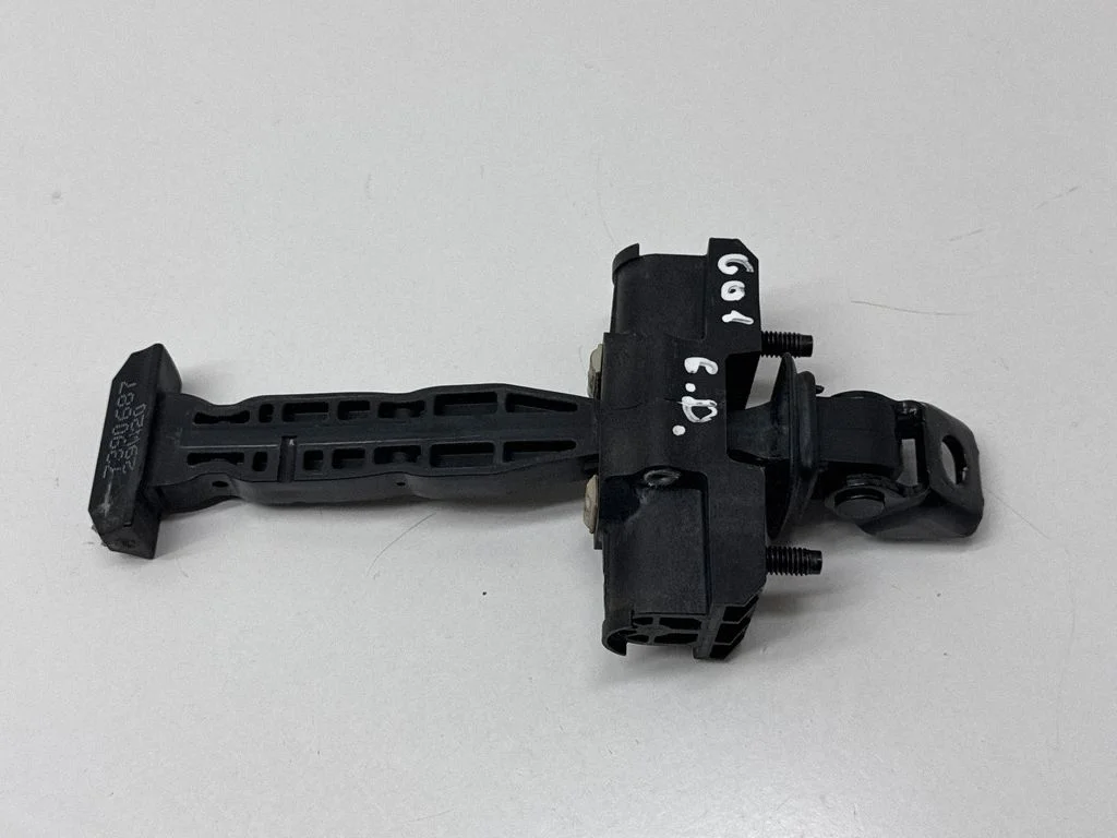Rear door check strap stopper 7390687