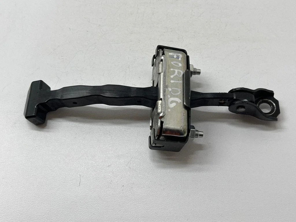 Rear door check strap stopper – rear right