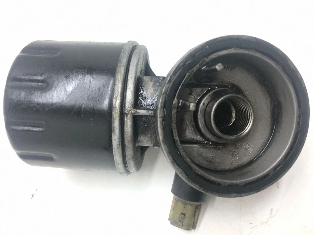 Õlifiltri hoidik/jahuti – Nissan Note (E11) (2006-2014)