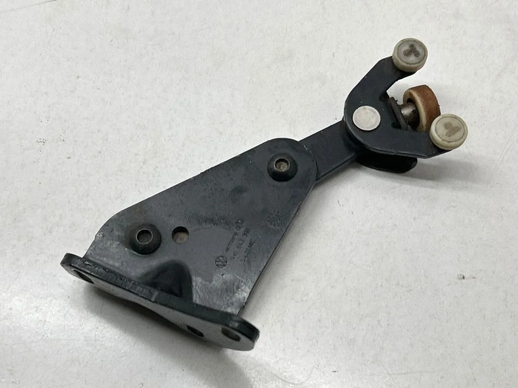 Sliding door lower roller guide/hinge 7H0843398