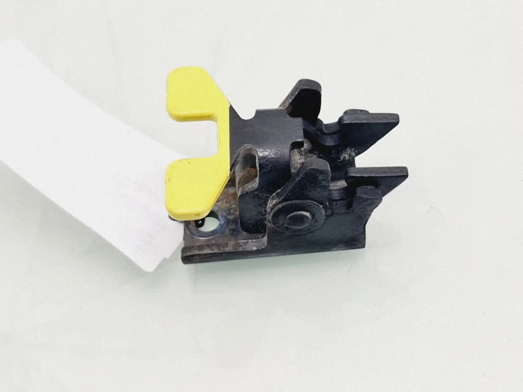 Loading door check strap stopper – rear
