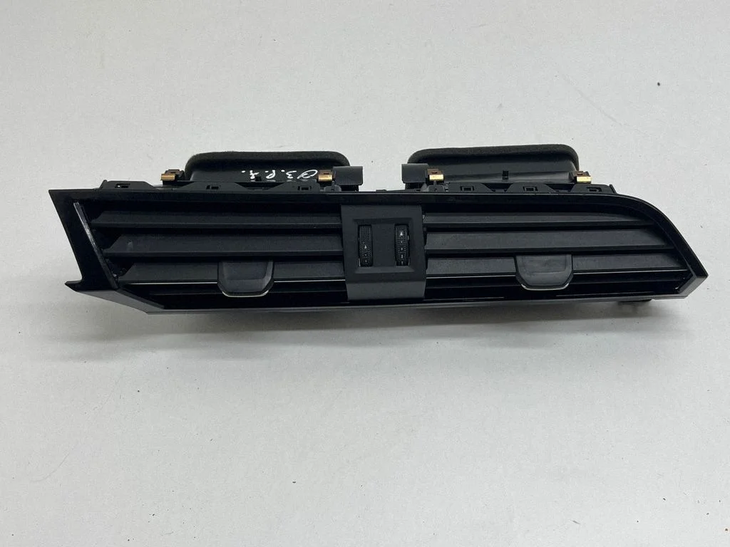 Dash center air vent grill 83B820903