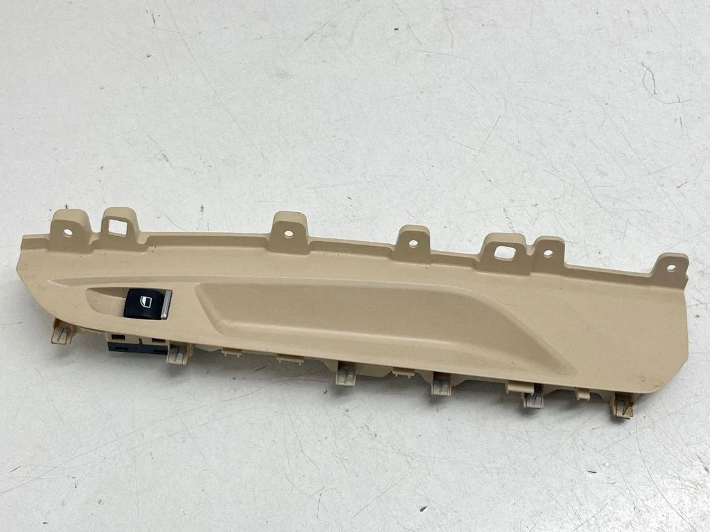 Front door window switch trim 7292310