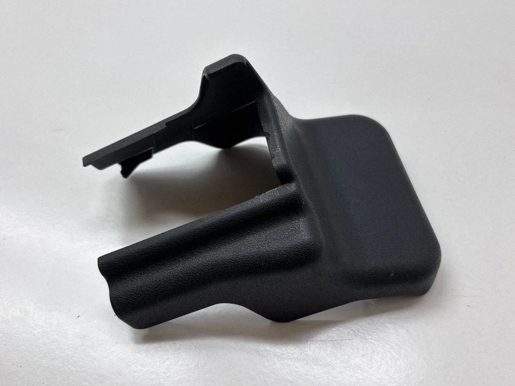 Front passenger seat rail trim 721270E050